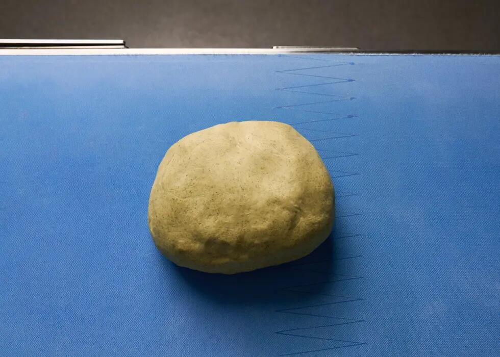 Dough on a transportation belt of a dough sheeter